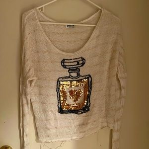 Paris Paris shirt, size medium. The shirt has a little unraveling on the bottom